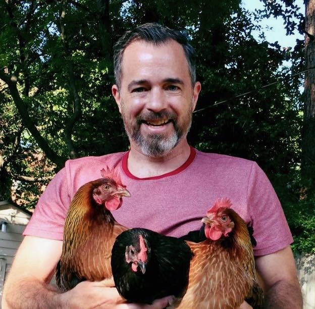 Photo of me with my chickens